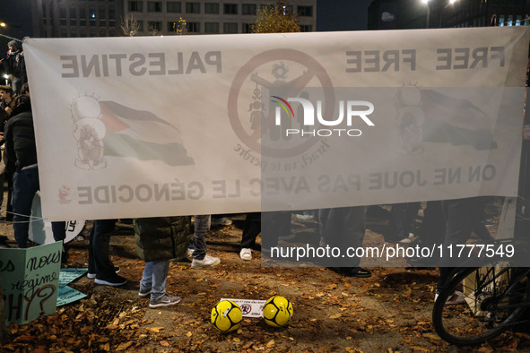 Demonstrators take part in a pro-Palestinian rally on the Place Du Front Populaire in Paris, France, on November 14, 2024, right before the...