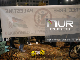 Demonstrators take part in a pro-Palestinian rally on the Place Du Front Populaire in Paris, France, on November 14, 2024, right before the...