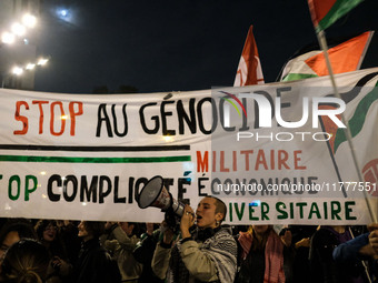 Demonstrators take part in a pro-Palestinian rally on the Place Du Front Populaire in Paris, France, on November 14, 2024, right before the...