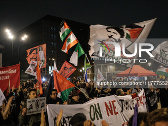 Demonstrators take part in a pro-Palestinian rally on the Place Du Front Populaire in Paris, France, on November 14, 2024, right before the...