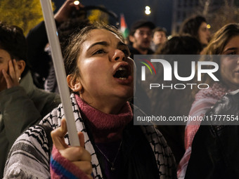 Demonstrators take part in a pro-Palestinian rally on the Place Du Front Populaire in Paris, France, on November 14, 2024, right before the...