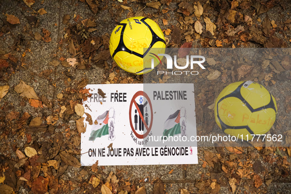 Demonstrators take part in a pro-Palestinian rally on the Place Du Front Populaire in Paris, France, on November 14, 2024, right before the...