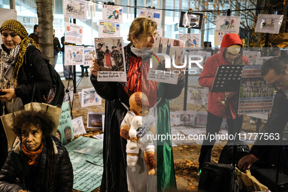 Demonstrators take part in a pro-Palestinian rally on the Place Du Front Populaire in Paris, France, on November 14, 2024, right before the...