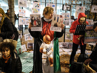 Demonstrators take part in a pro-Palestinian rally on the Place Du Front Populaire in Paris, France, on November 14, 2024, right before the...