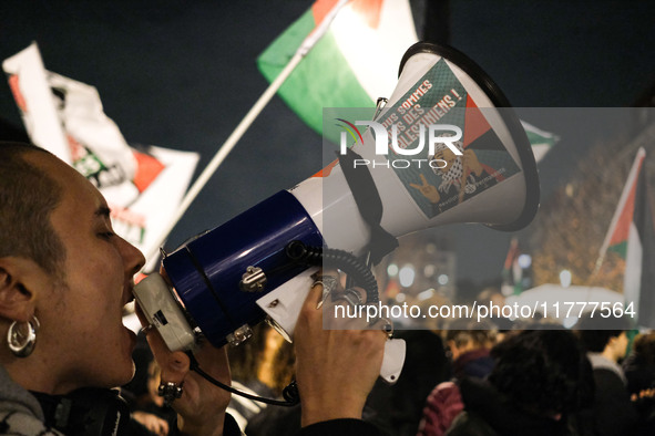 Demonstrators take part in a pro-Palestinian rally on the Place Du Front Populaire in Paris, France, on November 14, 2024, right before the...