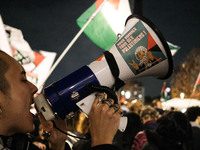 Demonstrators take part in a pro-Palestinian rally on the Place Du Front Populaire in Paris, France, on November 14, 2024, right before the...