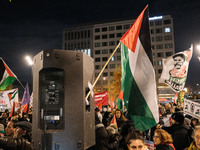 Demonstrators take part in a pro-Palestinian rally on the Place Du Front Populaire in Paris, France, on November 14, 2024, right before the...