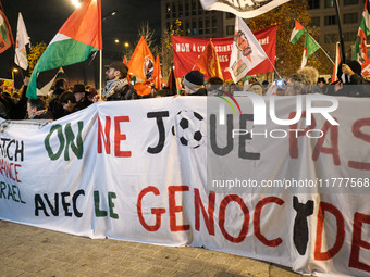 Demonstrators take part in a pro-Palestinian rally on the Place Du Front Populaire in Paris, France, on November 14, 2024, right before the...