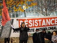 Demonstrators take part in a pro-Palestinian rally on the Place Du Front Populaire in Paris, France, on November 14, 2024, right before the...