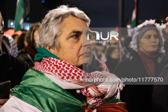 Demonstrators take part in a pro-Palestinian rally on the Place Du Front Populaire in Paris, France, on November 14, 2024, right before the...