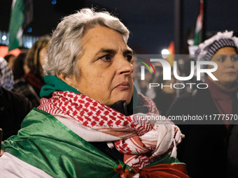 Demonstrators take part in a pro-Palestinian rally on the Place Du Front Populaire in Paris, France, on November 14, 2024, right before the...