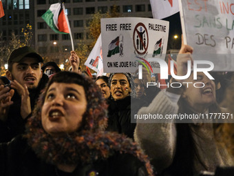 Demonstrators take part in a pro-Palestinian rally on the Place Du Front Populaire in Paris, France, on November 14, 2024, right before the...