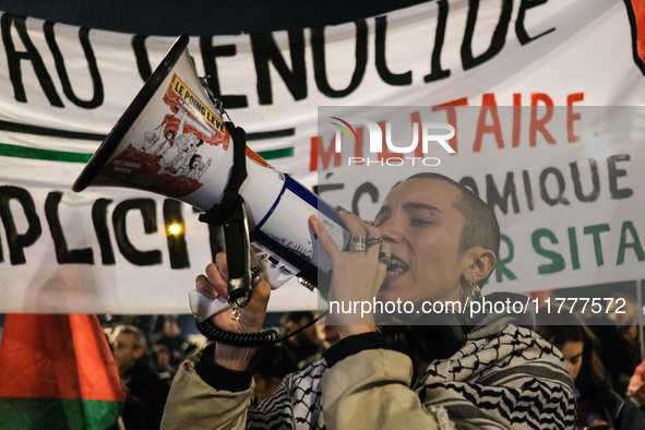 Demonstrators take part in a pro-Palestinian rally on the Place Du Front Populaire in Paris, France, on November 14, 2024, right before the...