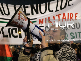 Demonstrators take part in a pro-Palestinian rally on the Place Du Front Populaire in Paris, France, on November 14, 2024, right before the...