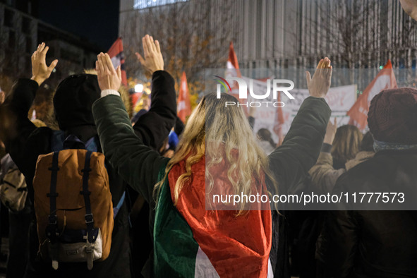 Demonstrators take part in a pro-Palestinian rally on the Place Du Front Populaire in Paris, France, on November 14, 2024, right before the...