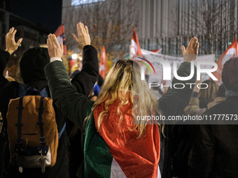 Demonstrators take part in a pro-Palestinian rally on the Place Du Front Populaire in Paris, France, on November 14, 2024, right before the...