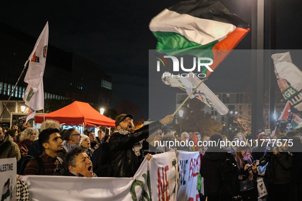 Demonstrators take part in a pro-Palestinian rally on the Place Du Front Populaire in Paris, France, on November 14, 2024, right before the...