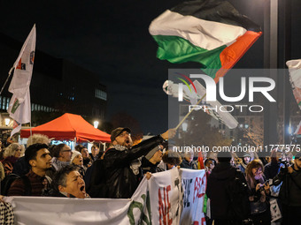 Demonstrators take part in a pro-Palestinian rally on the Place Du Front Populaire in Paris, France, on November 14, 2024, right before the...