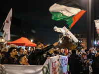 Demonstrators take part in a pro-Palestinian rally on the Place Du Front Populaire in Paris, France, on November 14, 2024, right before the...