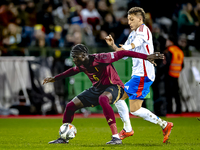 Belgium midfielder Amadou Onana and Italy defender Alessandro Buongiorno play during the match between Belgium and Italy at the King Baudoui...