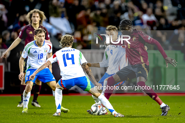 Belgium midfielder Amadou Onana and Italy defender Alessandro Buongiorno play during the match between Belgium and Italy at the King Baudoui...