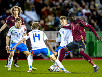 Belgium midfielder Amadou Onana and Italy defender Alessandro Buongiorno play during the match between Belgium and Italy at the King Baudoui...