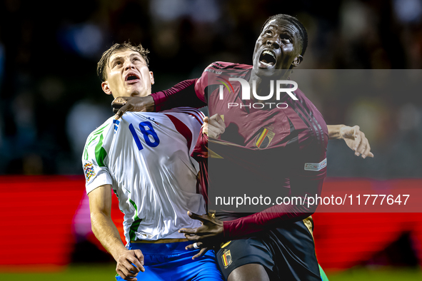 Italy midfielder Nicolo Barella and Belgium midfielder Amadou Onana play during the match between Belgium and Italy at the King Baudouin Sta...