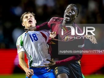 Italy midfielder Nicolo Barella and Belgium midfielder Amadou Onana play during the match between Belgium and Italy at the King Baudouin Sta...