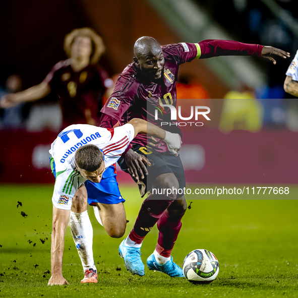 Italy defender Alessandro Buongiorno and Belgium forward Romelu Lukaku play during the match between Belgium and Italy at the King Baudouin...