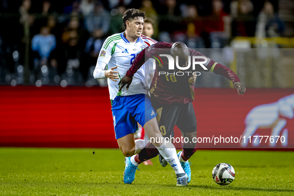 Italy defender Alessandro Bastoni and Belgium forward Romelu Lukaku play during the match between Belgium and Italy at the King Baudouin Sta...