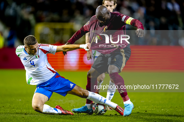 Italy defender Alessandro Buongiorno and Belgium forward Romelu Lukaku play during the match between Belgium and Italy at the King Baudouin...