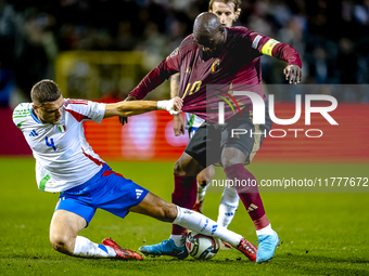 Italy defender Alessandro Buongiorno and Belgium forward Romelu Lukaku play during the match between Belgium and Italy at the King Baudouin...