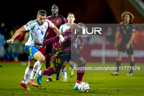 Italy defender Alessandro Buongiorno and Belgium forward Romelu Lukaku play during the match between Belgium and Italy at the King Baudouin...