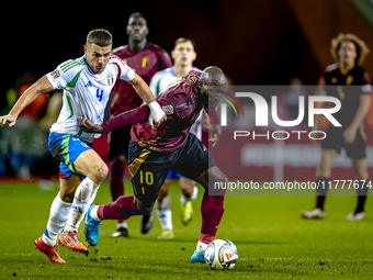 Italy defender Alessandro Buongiorno and Belgium forward Romelu Lukaku play during the match between Belgium and Italy at the King Baudouin...