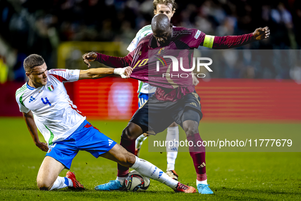 Italy defender Alessandro Buongiorno and Belgium forward Romelu Lukaku play during the match between Belgium and Italy at the King Baudouin...