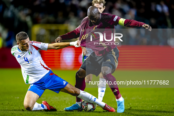 Italy defender Alessandro Buongiorno and Belgium forward Romelu Lukaku play during the match between Belgium and Italy at the King Baudouin...