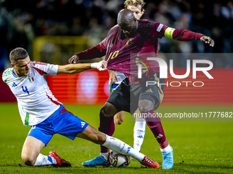 Italy defender Alessandro Buongiorno and Belgium forward Romelu Lukaku play during the match between Belgium and Italy at the King Baudouin...