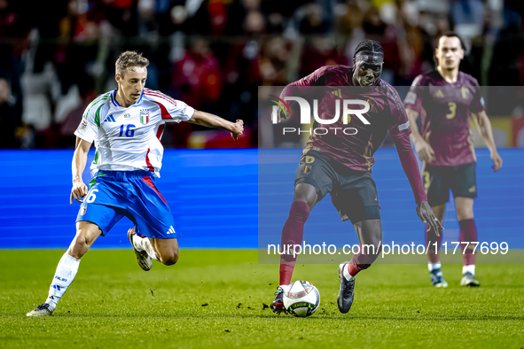 Belgium midfielder Amadou Onana and Italy midfielder Davide Frattesi play during the match between Belgium and Italy at the King Baudouin St...