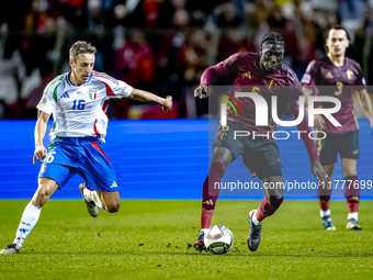 Belgium midfielder Amadou Onana and Italy midfielder Davide Frattesi play during the match between Belgium and Italy at the King Baudouin St...