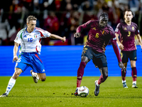 Belgium midfielder Amadou Onana and Italy midfielder Davide Frattesi play during the match between Belgium and Italy at the King Baudouin St...