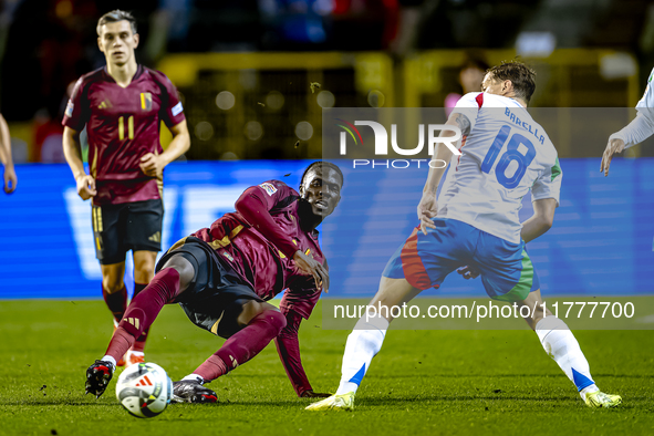 Belgium midfielder Amadou Onana and Italy midfielder Nicolo Barella play during the match between Belgium and Italy at the King Baudouin Sta...