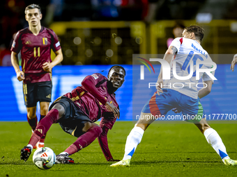 Belgium midfielder Amadou Onana and Italy midfielder Nicolo Barella play during the match between Belgium and Italy at the King Baudouin Sta...