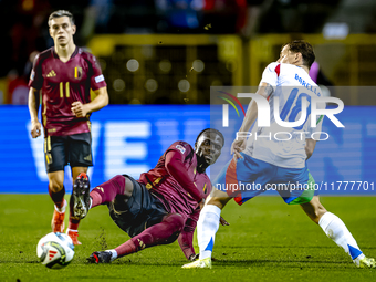 Belgium midfielder Amadou Onana and Italy midfielder Nicolo Barella play during the match between Belgium and Italy at the King Baudouin Sta...