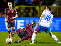 Belgium midfielder Amadou Onana and Italy midfielder Nicolo Barella play during the match between Belgium and Italy at the King Baudouin Sta...