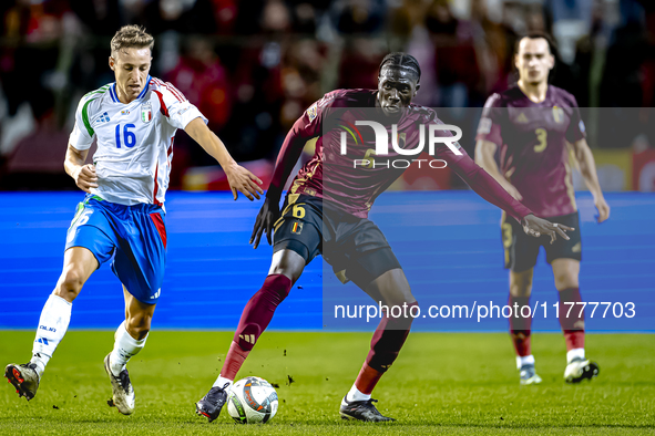 Belgium midfielder Amadou Onana and Italy midfielder Davide Frattesi play during the match between Belgium and Italy at the King Baudouin St...