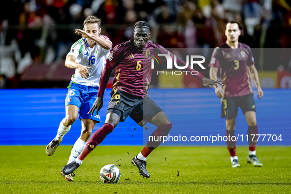 Belgium midfielder Amadou Onana and Italy midfielder Davide Frattesi play during the match between Belgium and Italy at the King Baudouin St...