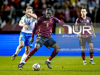 Belgium midfielder Amadou Onana and Italy midfielder Davide Frattesi play during the match between Belgium and Italy at the King Baudouin St...