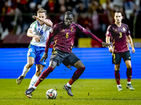 Belgium midfielder Amadou Onana and Italy midfielder Davide Frattesi play during the match between Belgium and Italy at the King Baudouin St...