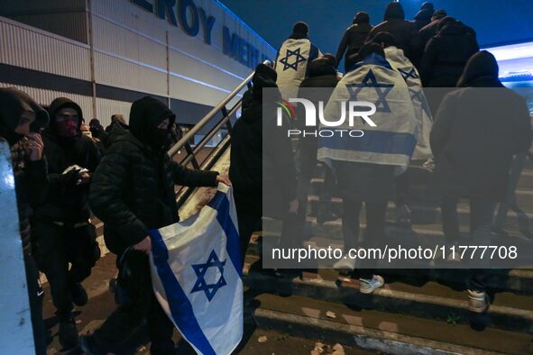 Supporters with Israeli flags queue outside the Stade de France stadium ahead of the UEFA Nations League League A, Group A2 football match b...