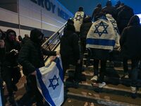 Supporters with Israeli flags queue outside the Stade de France stadium ahead of the UEFA Nations League League A, Group A2 football match b...